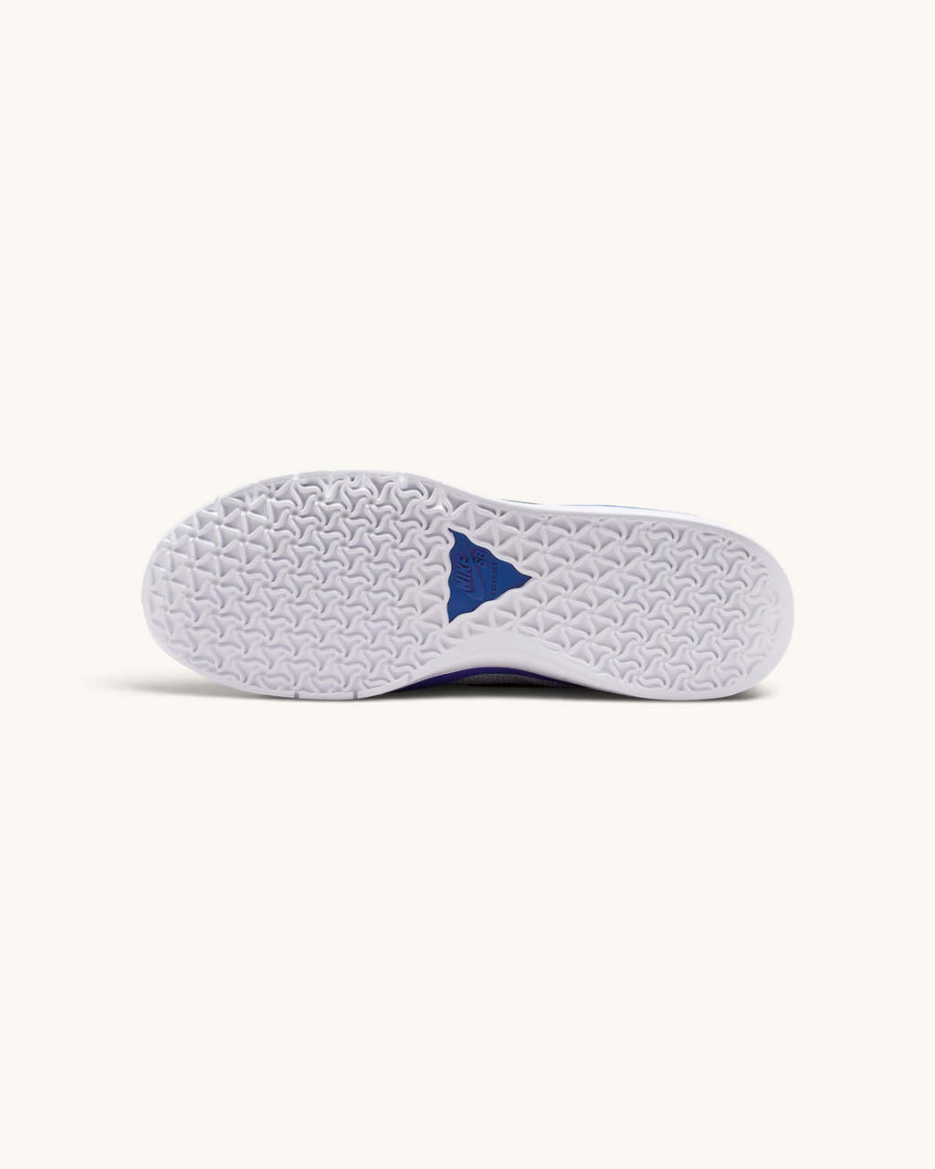 Suela blanca HART de las zapatillas de skate Nike SB PS8 de FRIDAY.COM.CO con patrón gráfico y detalle azul