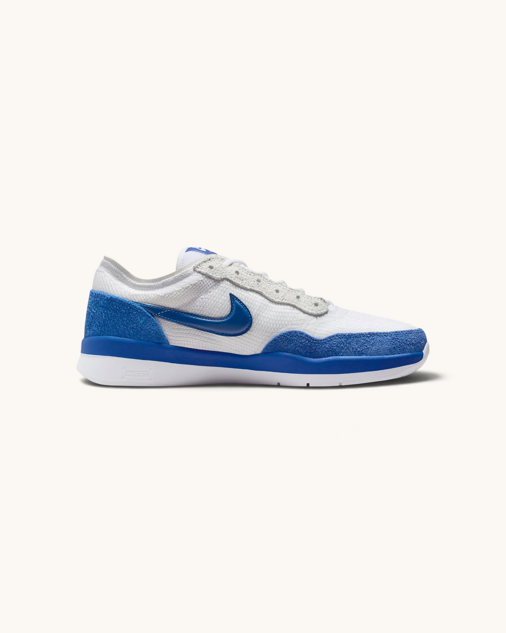 Tenis de skate Nike SB PS8 FRIDAY.COM.CO en color blanco y azul con tejido Flyknit y detalles de cuero