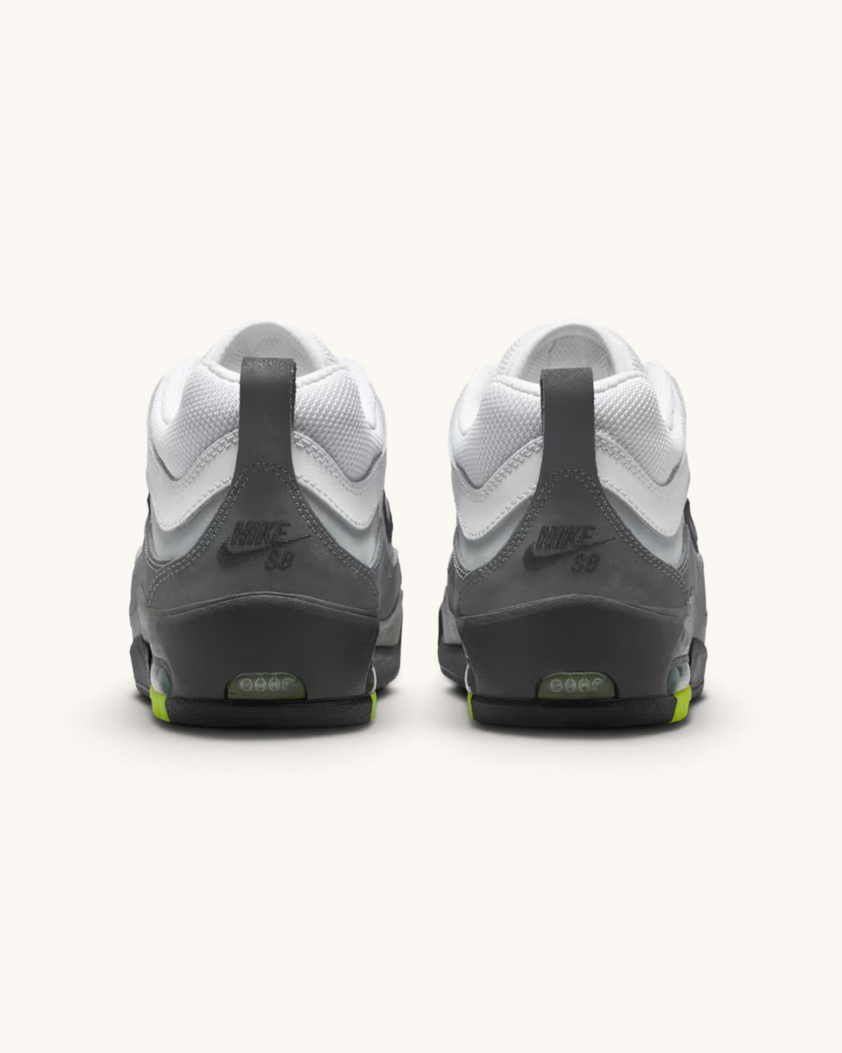 Back view of FRIDAY.COM.CO Nike Air Max Ishod OG skate shoes in white, grey, and neon yellow with Nike SB branding.
