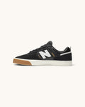 FRIDAY.COM.CO New Balance Numeric 306 skate shoes in black suede and mesh with a white N logo and gum rubber sole.