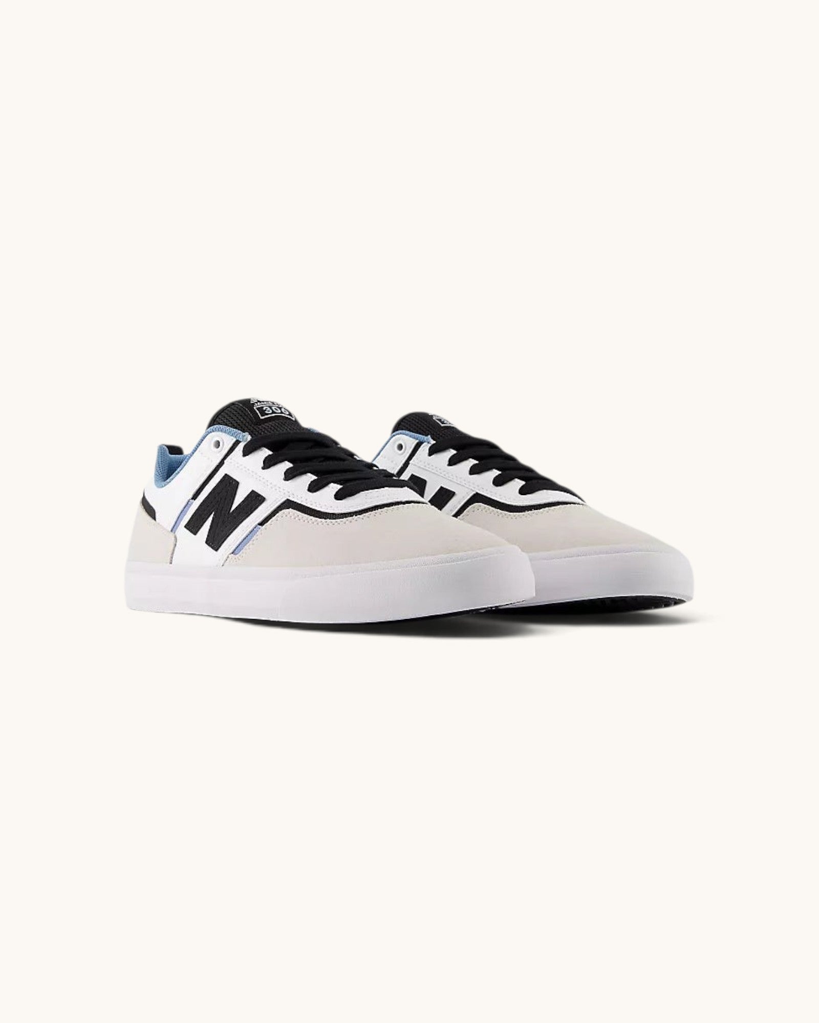 FRIDAY.COM.CO New Balance Numeric 306 skate shoes in white suede and mesh with black accents and vulcanized sole.
