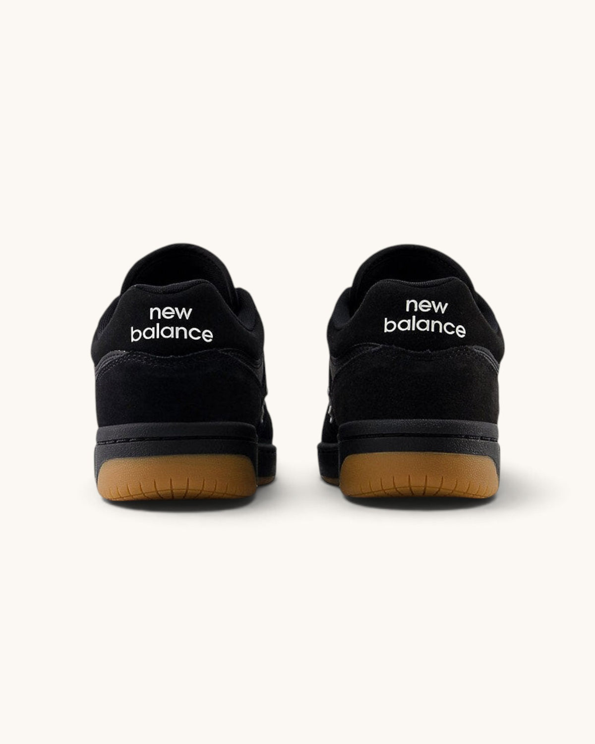 FRIDAY.COM.CO New Balance Numeric 480 skate shoes in black suede with white branding and gum rubber soles, rear view.