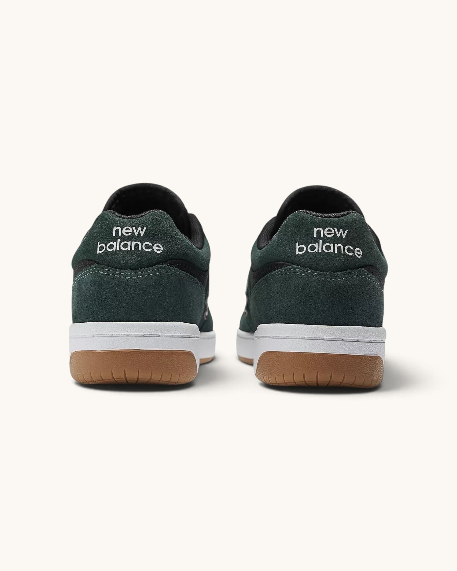 FRIDAY.COM.CO New Balance Numeric 480 skate shoes in forest green and black suede with gum rubber soles, rear view.