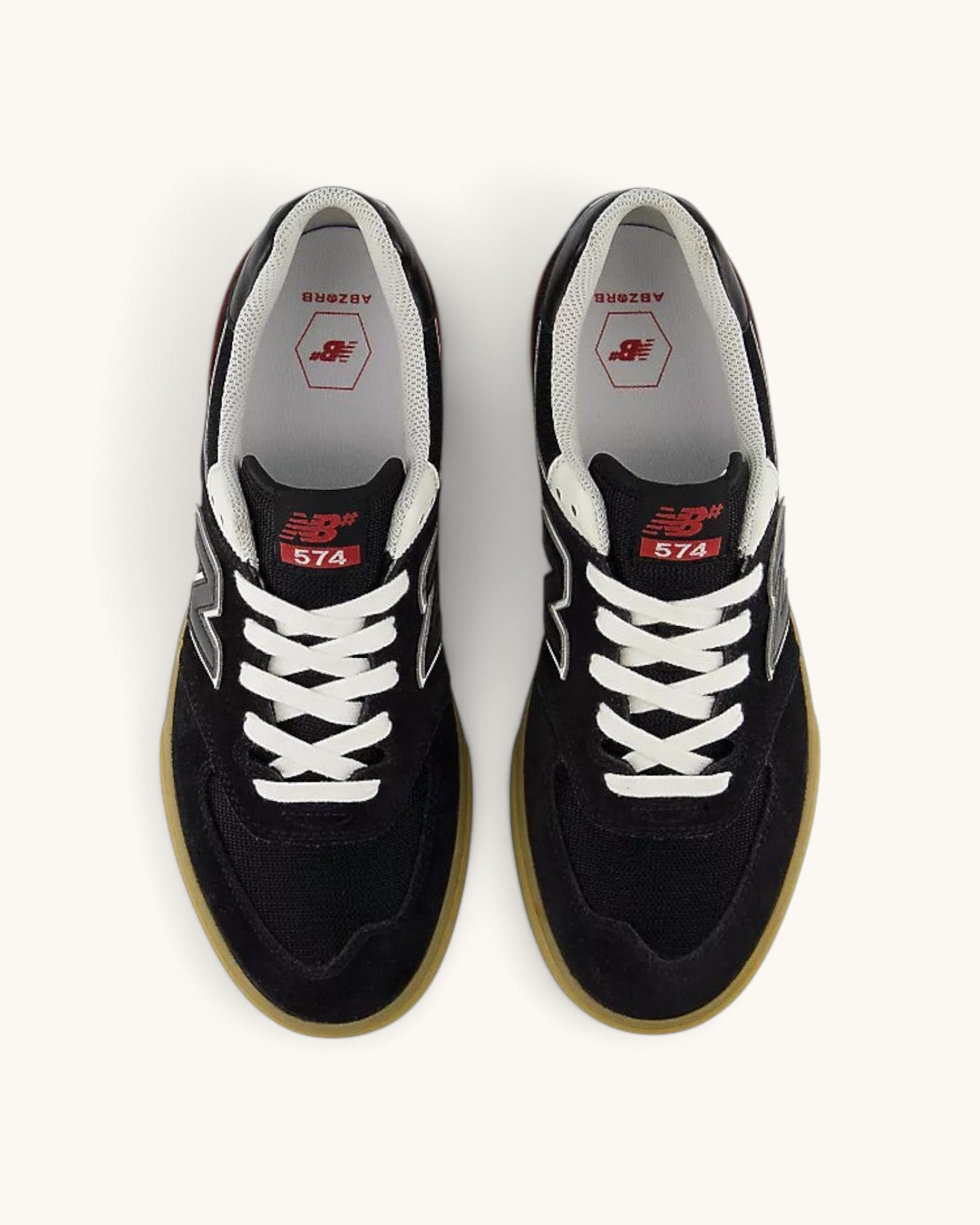 FRIDAY.COM.CO New Balance Numeric 574 Vulc black skate shoes with white laces and gum rubber soles, top view.