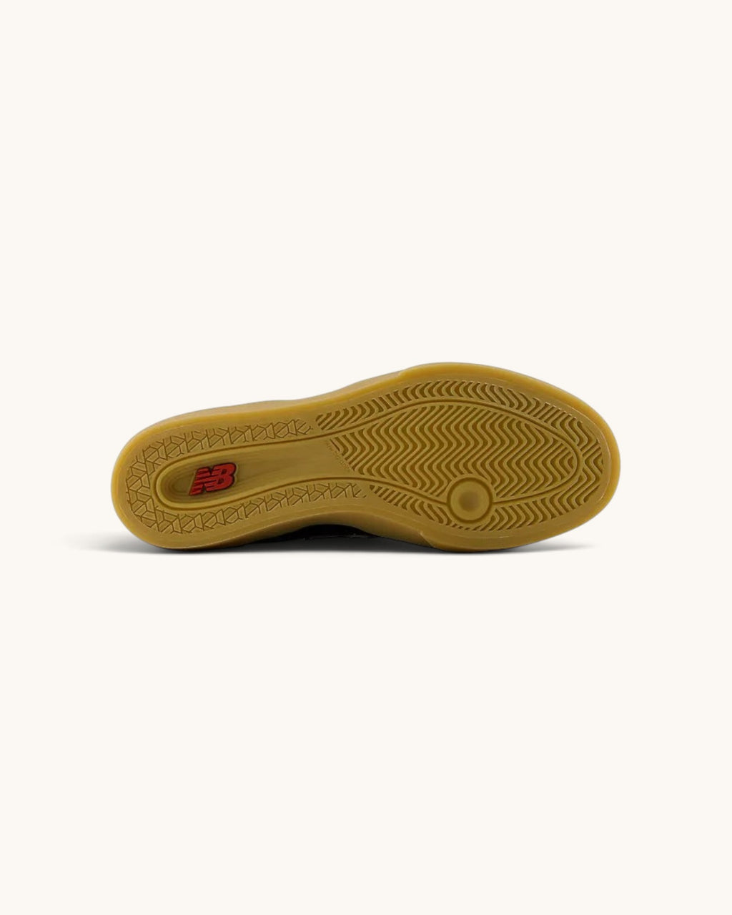 FRIDAY.COM.CO New Balance Numeric 574 Vulc skate shoe with a durable gum rubber outsole and herringbone tread pattern