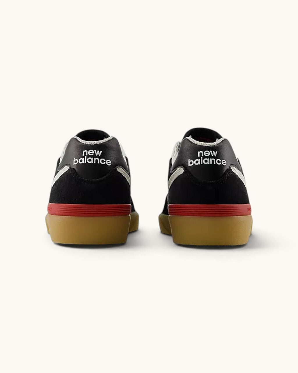 Rear view of FRIDAY.COM.CO New Balance Numeric 574 Vulc skate shoes in black suede with red and gum rubber soles.