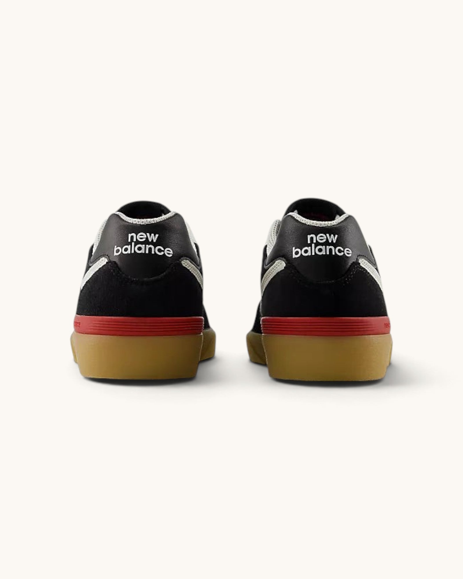 Rear view of FRIDAY.COM.CO New Balance Numeric 574 Vulc skate shoes in black suede with red and gum rubber soles.