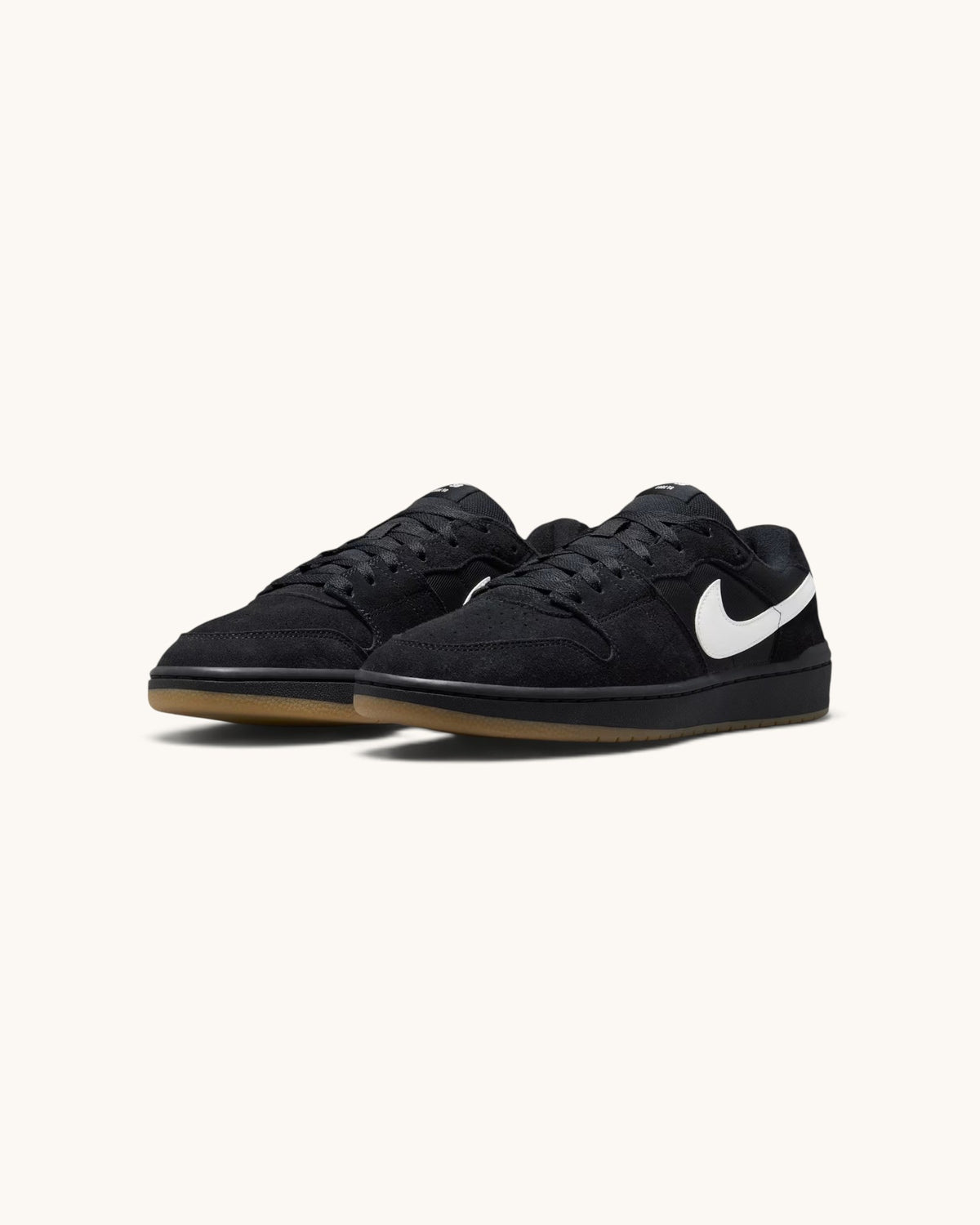 FRIDAY.COM.CO Nike SB Code 58 skate shoes in black suede with a white swoosh and gum rubber cupsole
