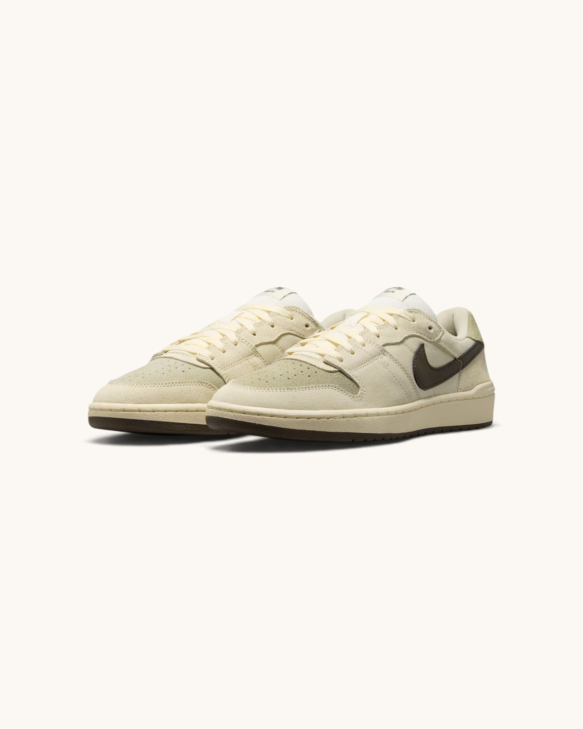 FRIDAY.COM.CO Nike SB Code 58 sneakers in pale ivory suede and synthetic leather with a dark brown swoosh.
