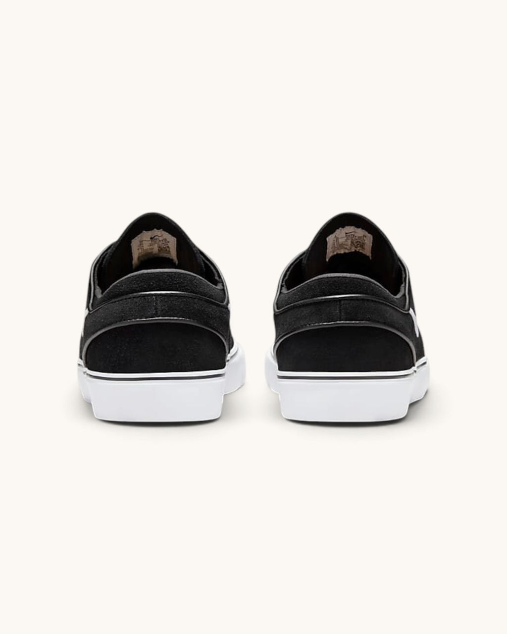 Back view of FRIDAY.COM.CO Nike SB Zoom Janoski OG+ skate shoes in black suede with white vulcanized soles.