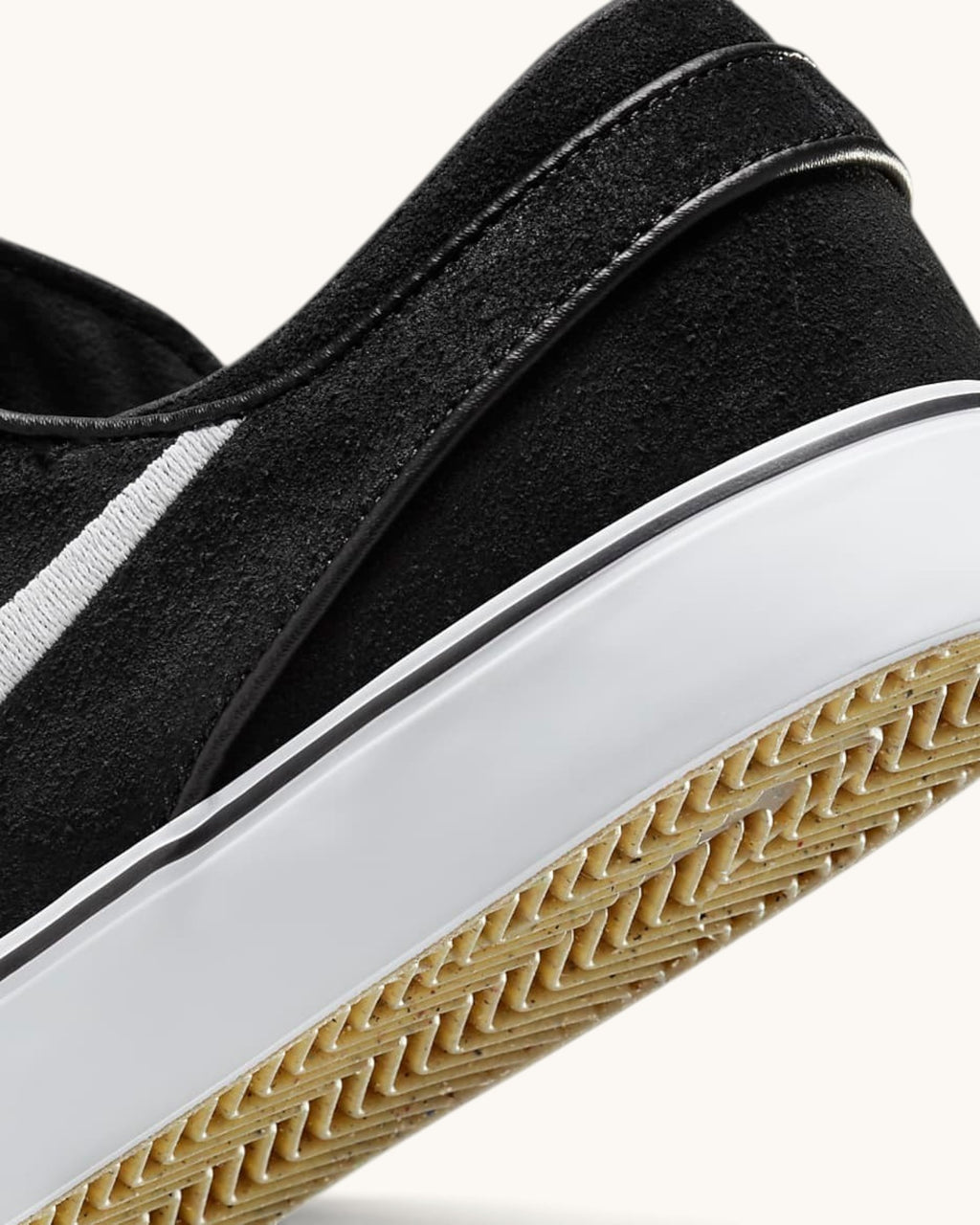 FRIDAY.COM.CO Nike SB Zoom Janoski OG+ black suede skate shoe with white Swoosh and textured gum rubber sole