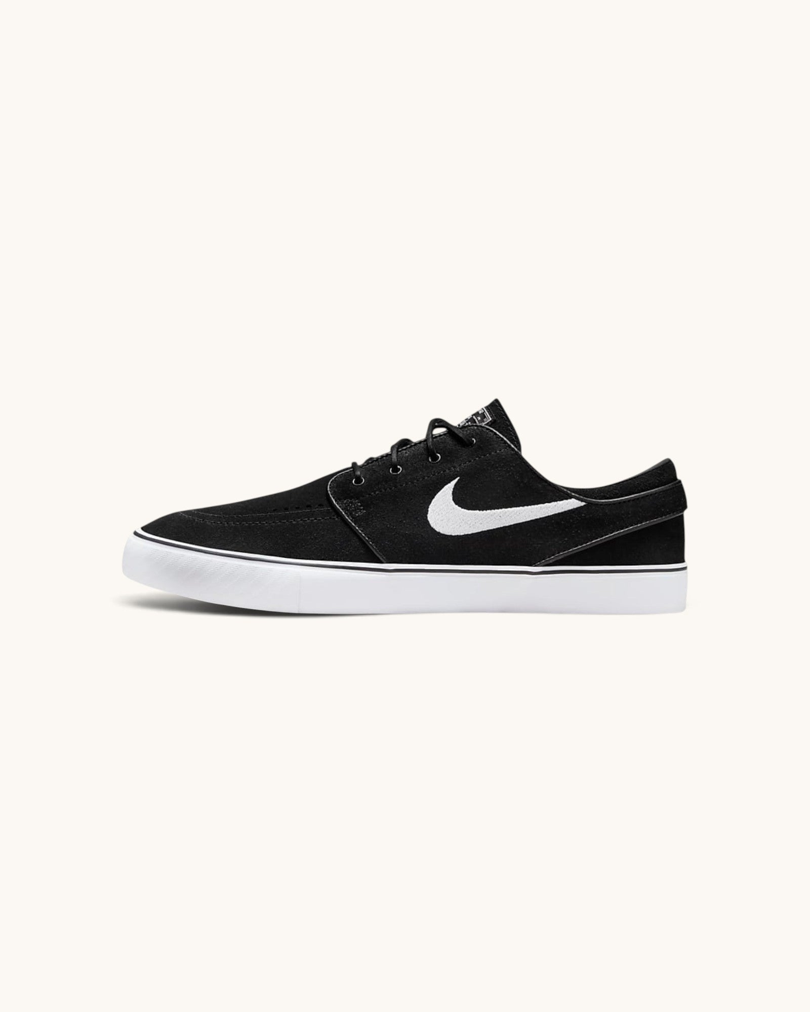 FRIDAY.COM.CO Nike SB Zoom Janoski OG+ skate shoes in black suede with a white Swoosh and vulcanized rubber sole.