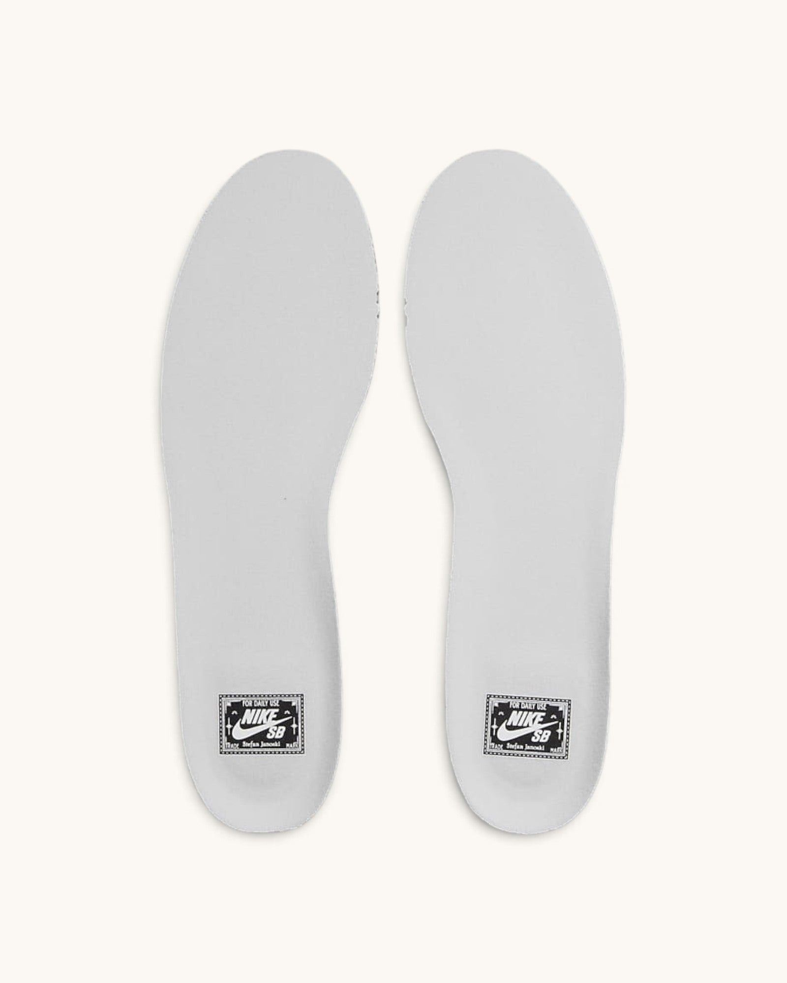 FRIDAY.COM.CO white Nike SB Zoom Janoski OG+ sneaker insoles with black branding labels