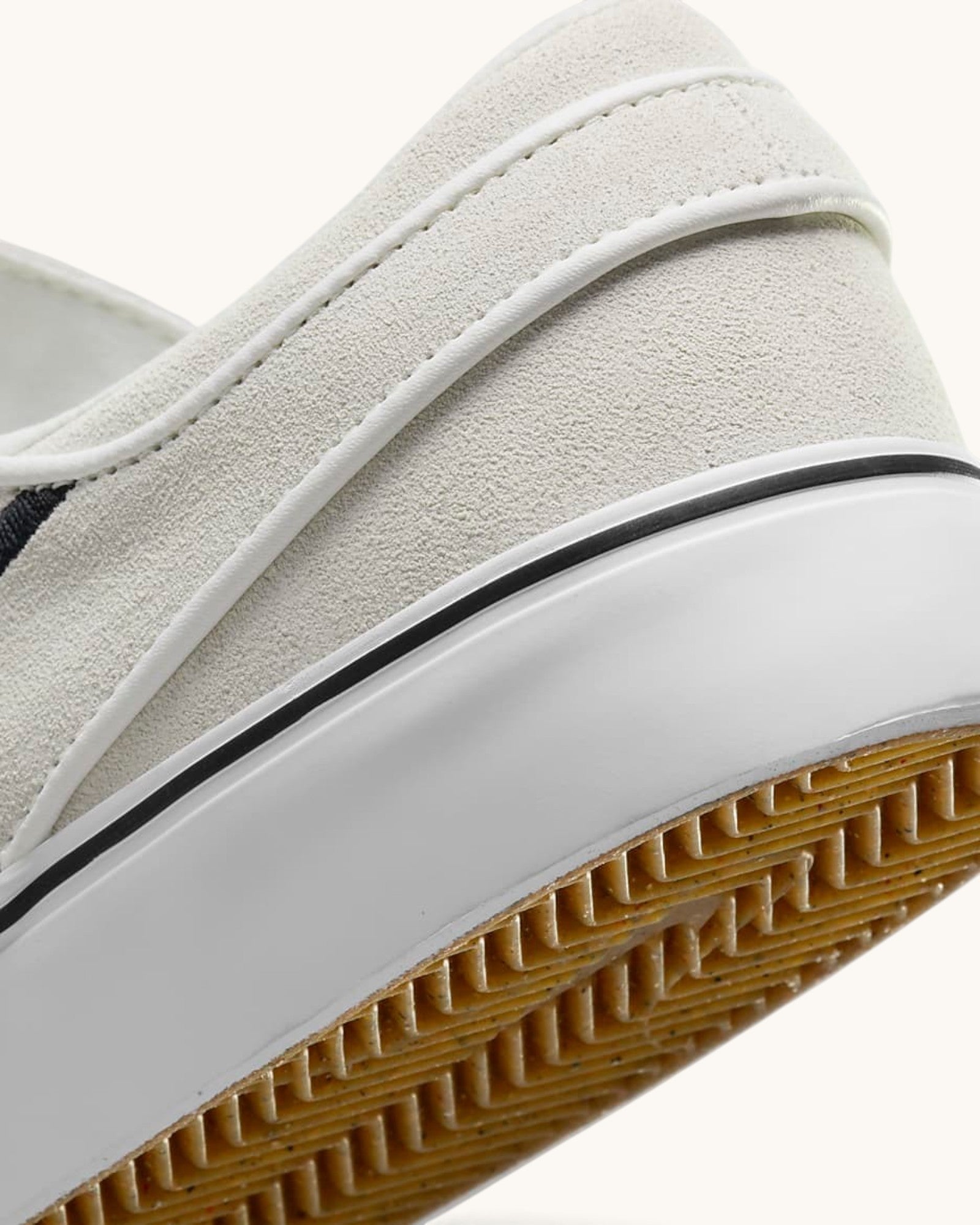 FRIDAY.COM.CO Nike SB Zoom Janoski OG+ skate shoe featuring light grey suede upper and gum rubber vulcanized sole