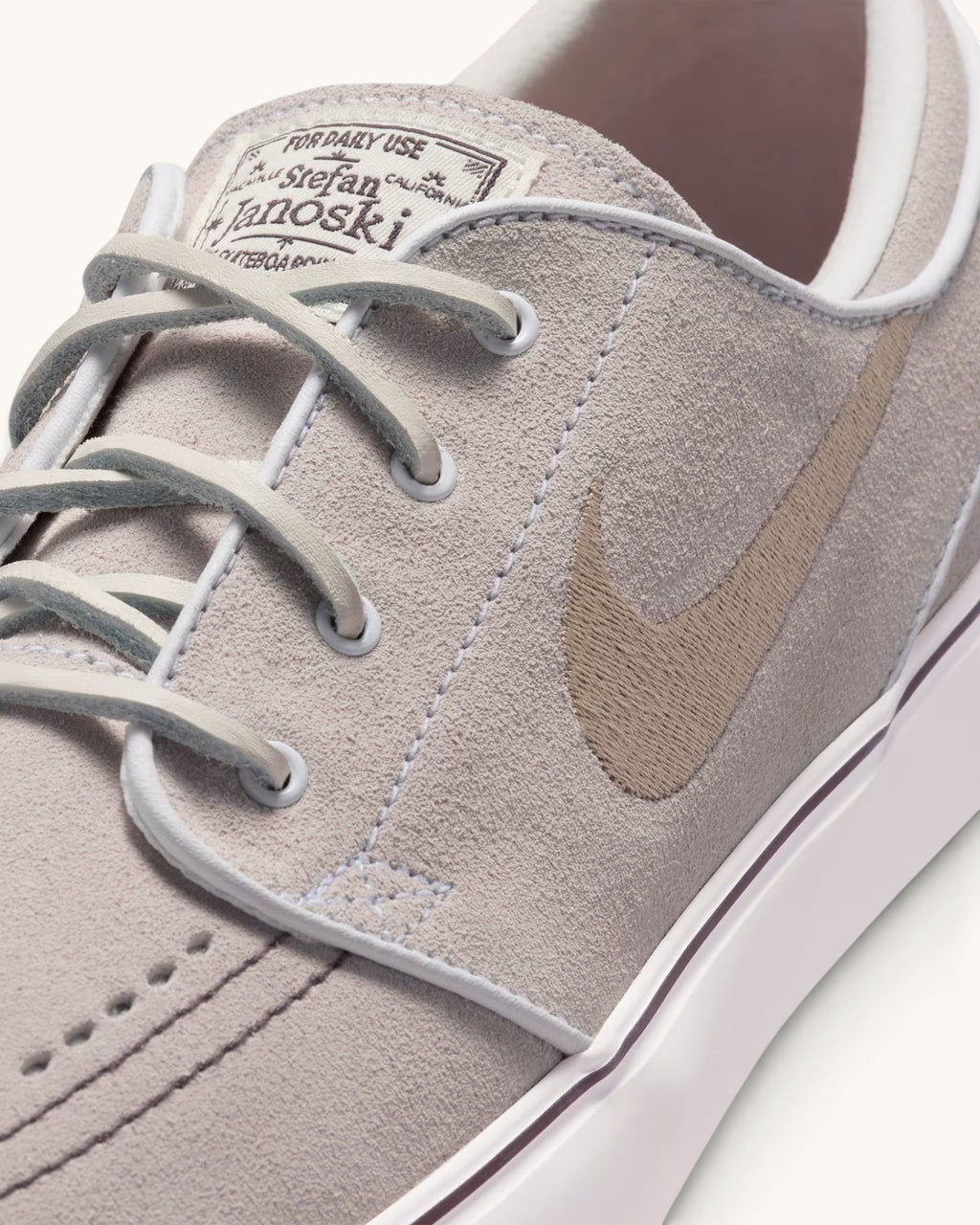 FRIDAY.COM.CO Nike SB Zoom Janoski OG+ skate shoe in light chocolate suede with a tan Swoosh and white sole.