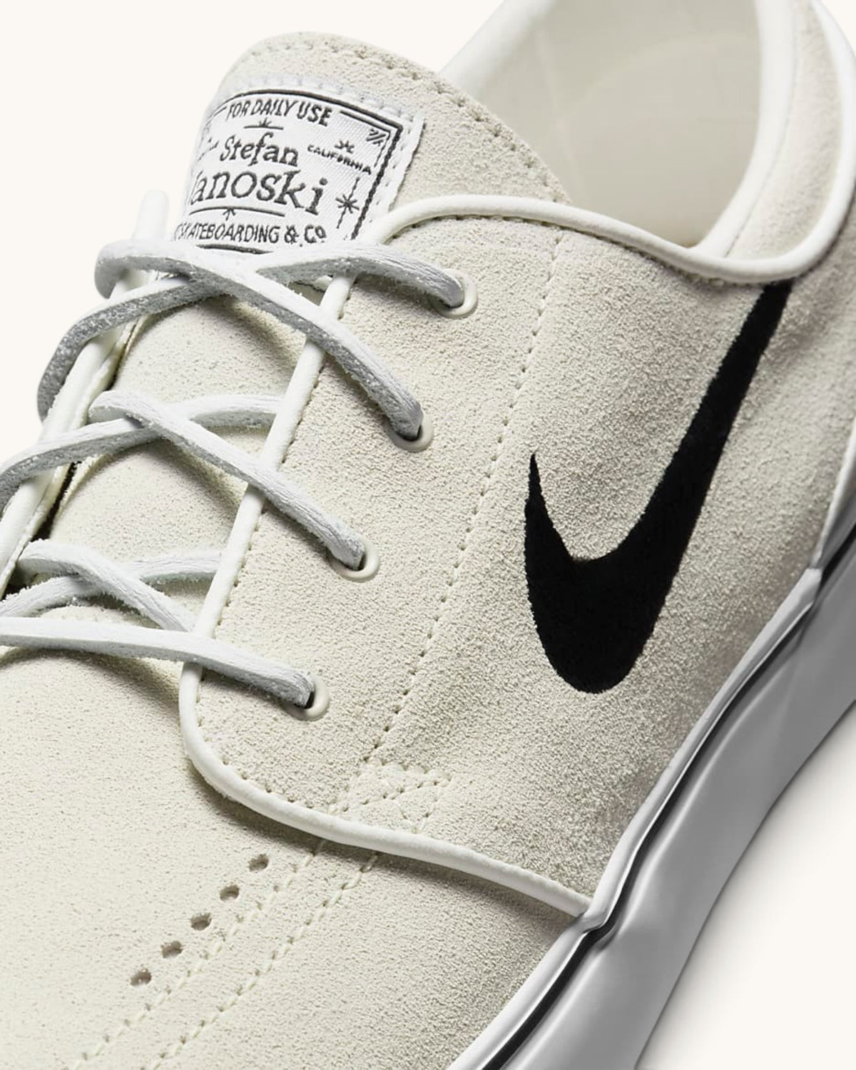 FRIDAY.COM.CO Nike SB Zoom Janoski OG+ skate shoe in off-white suede with black Swoosh and branded tongue label