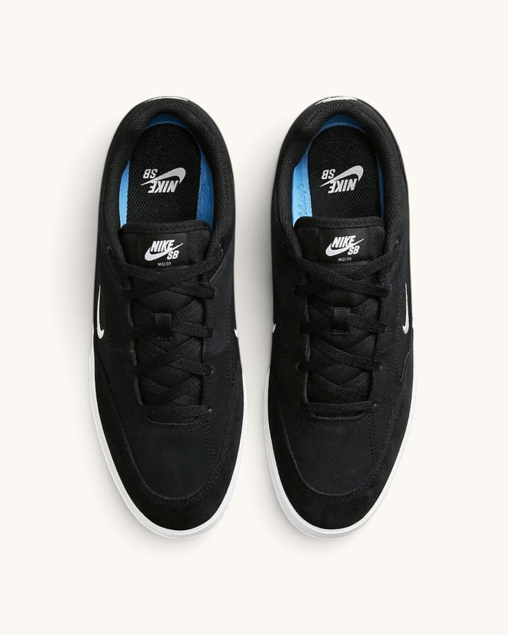 FRIDAY.COM.CO Nike SB Malor skate shoes in black suede and mesh with white vulcanized soles, top-down view.