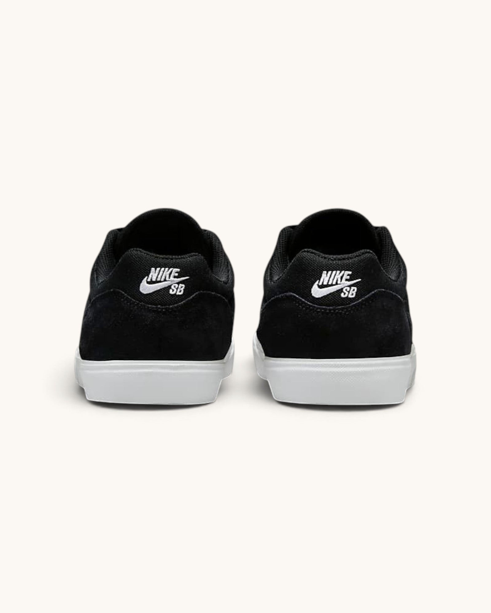 FRIDAY.COM.CO Nike SB Malor skate shoes in black suede with white soles, rear view showing Nike SB branding.
