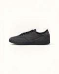 Tenis FRIDAY.COM.CO New Balance Numeric 440 grises oscuros y negros de gamuza y malla con logo N blanco y suela de goma.