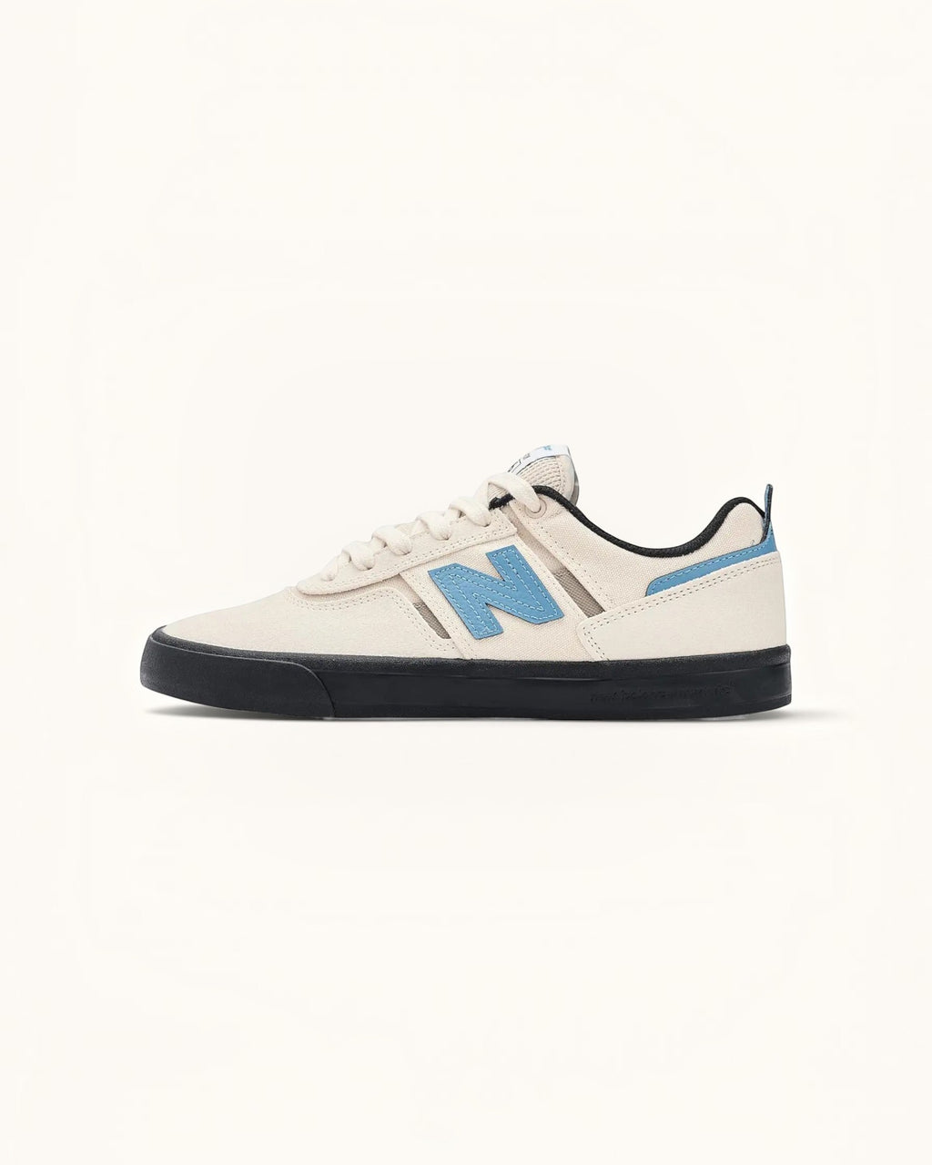 Tenis New Balance Numeric 306 Sea Salt/Black de ante y malla con logo N azul y suela negra.