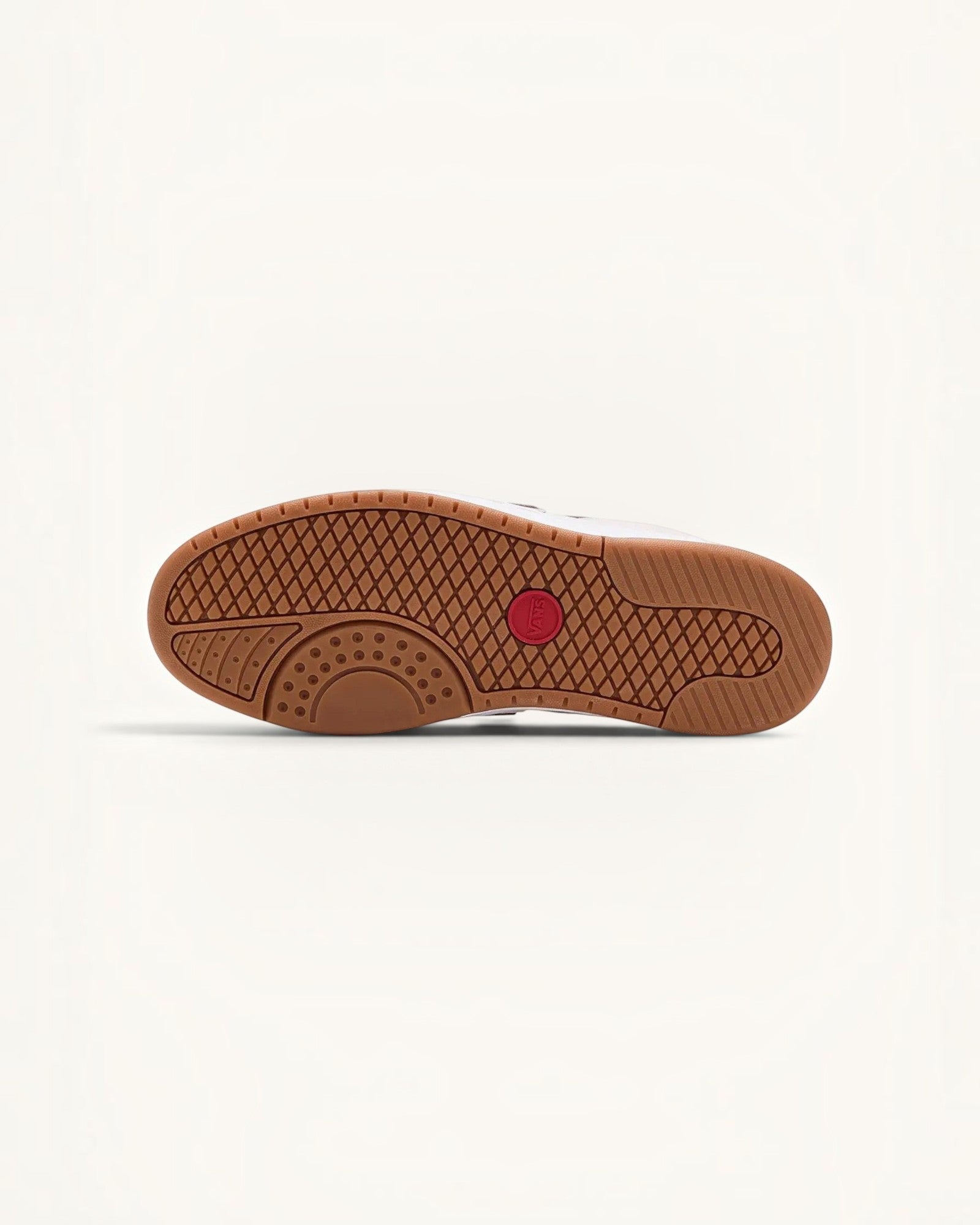Suela de goma marrón con patrón de diamante y logo rojo de Vans en tenis FRIDAY.COM.CO.