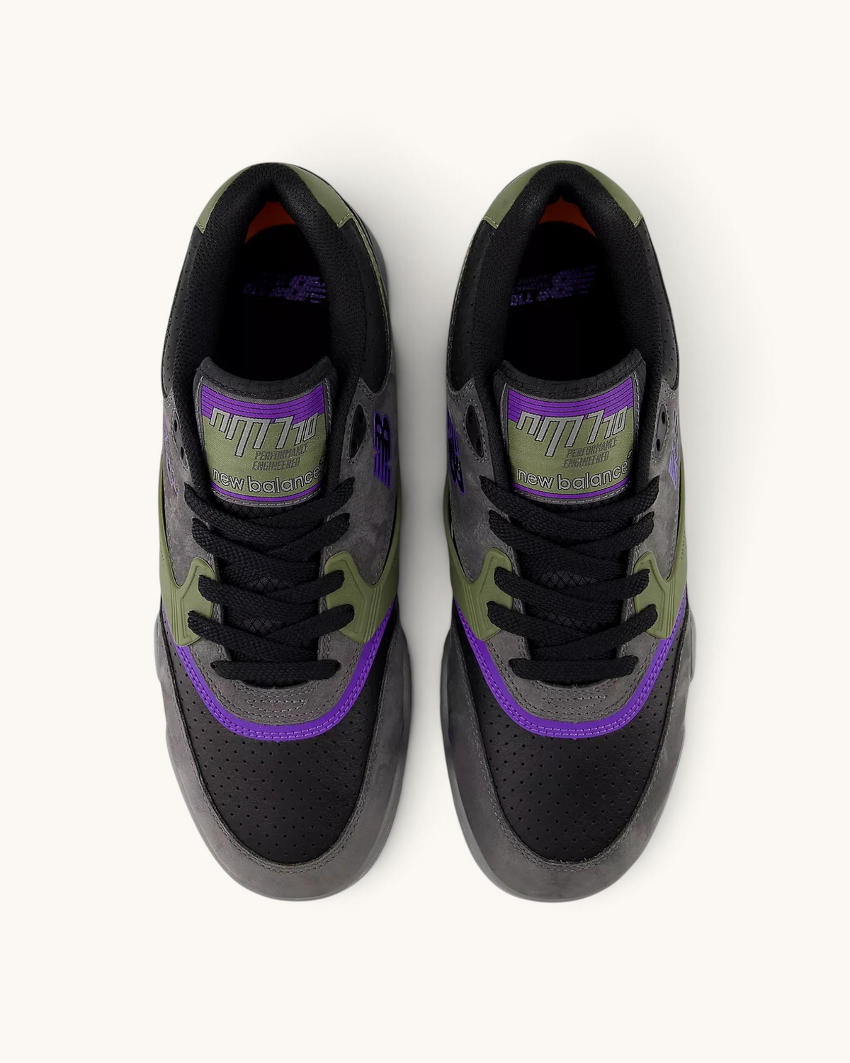 Tenis de skate FRIDAY.COM.CO New Balance Numeric 770 en gris, negro y morado con diseño de corte lifestyle