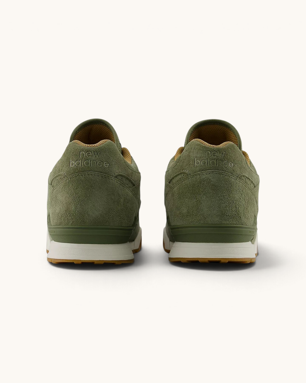 Vista trasera de los tenis FRIDAY.COM.CO New Balance Numeric 770 en color verde oliva con suela de goma